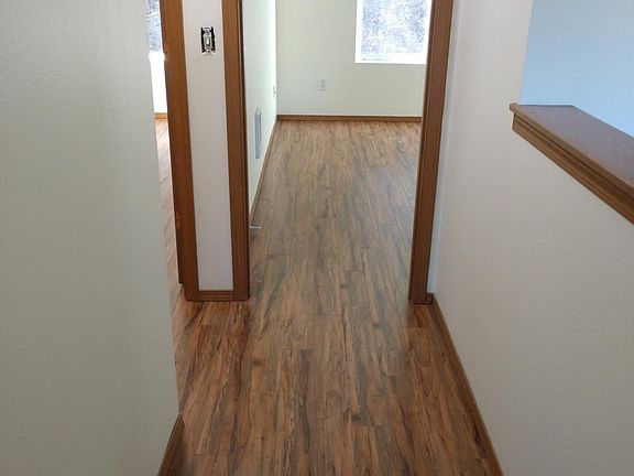 Vinyl plank flooring throughout upstairs in all 3 bedrooms. There are 2 2 full bathrooms.