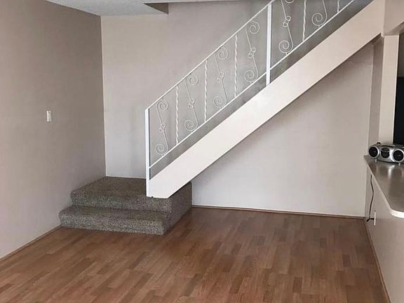 Kitchen to the right. Bedrooms and bathroom upstairs