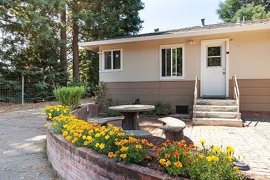 Left side of back entrance with seating area