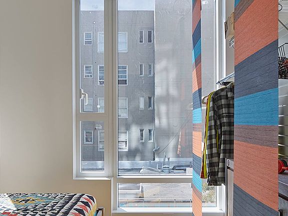Bedroom with hard surface flooring