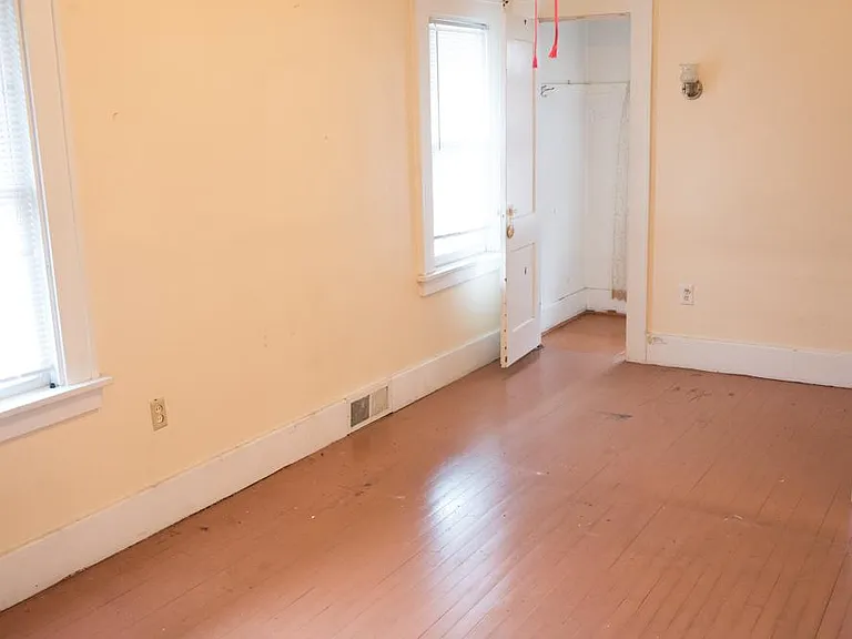 Master Bedroom with a large window in the closet