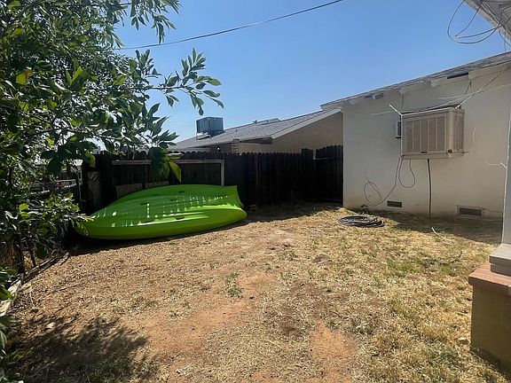 back of house roof will be black yard will be manicured.