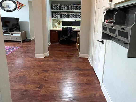 Built-in office space located off the living area