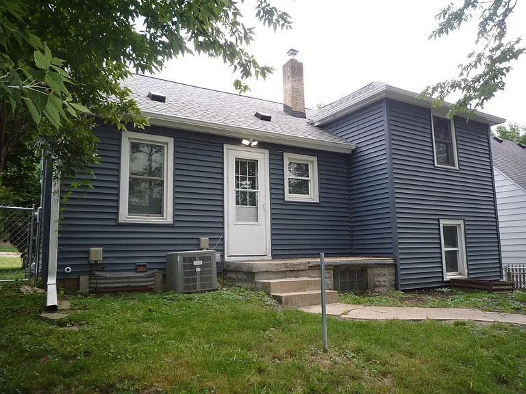 Back of the house, notice the little porch