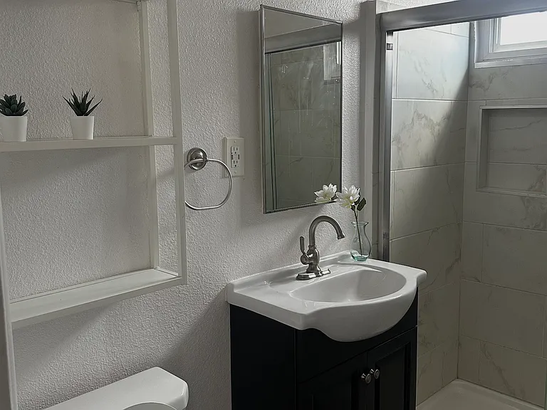 Bathroom- Has shower and plenty of storage