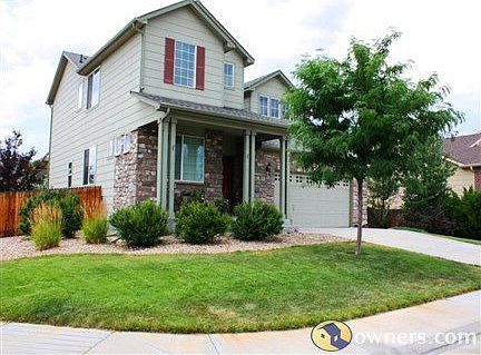 Corner lot opens to green space behind house
