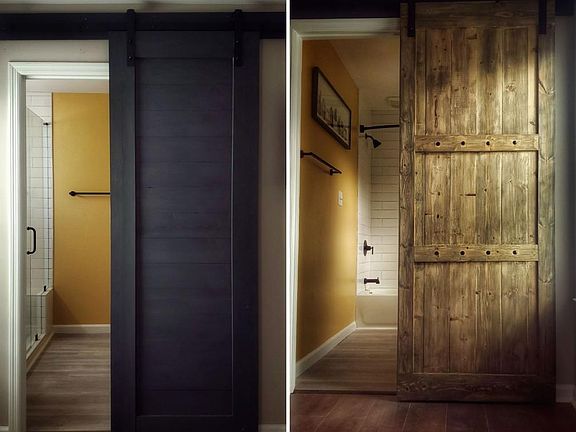 Both upstairs bathrooms have sliding barn doors.