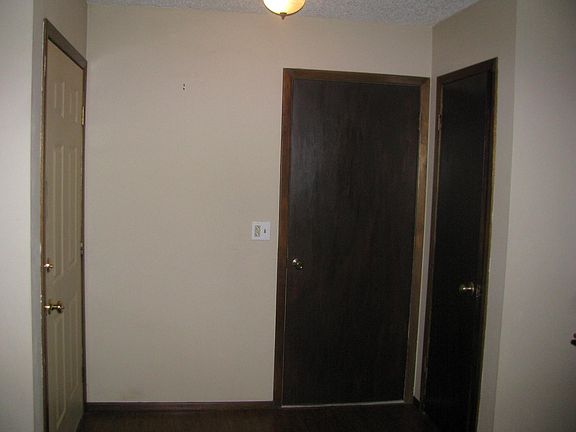 Front Entry, Coat Closet & Garage Door.