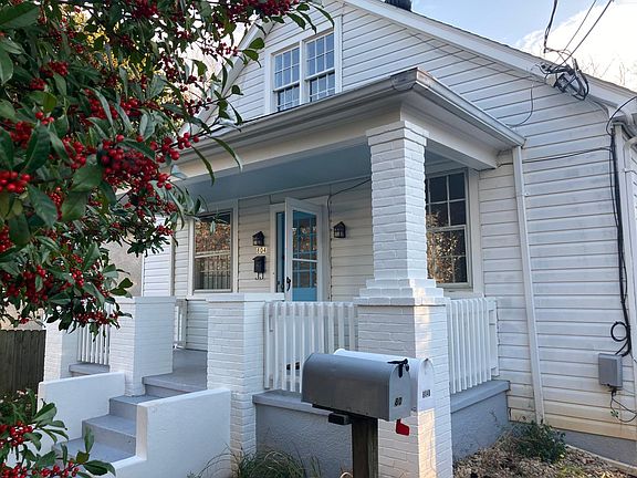 Greet friends and neighbors from the freshly painted front porch.