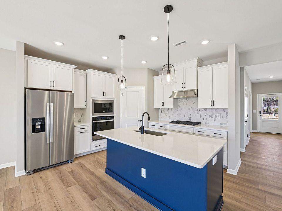 Kitchen in the Chatham floorplan at a Meritage Homes community in Raleigh, NC.