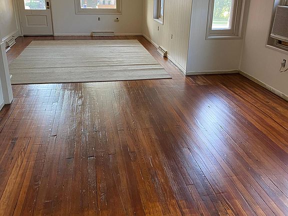 Connected to the back of this livingrm/diningrm is a large open kitchen.