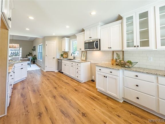 Beautiful kitchen with white cabintry
