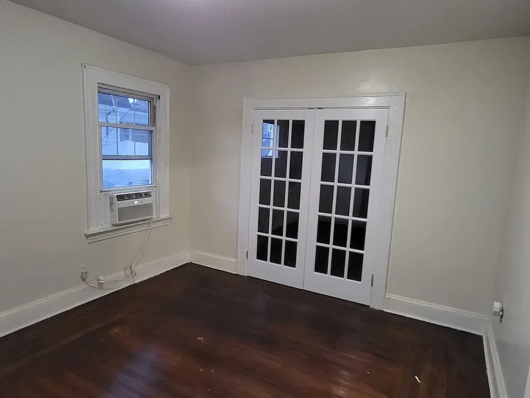 Dining room, with French door opening onto the living room.
