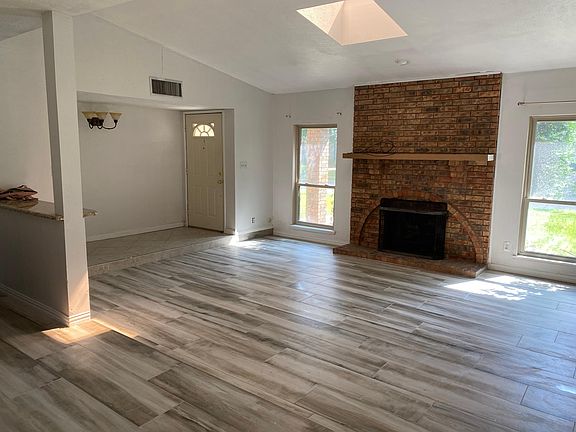 Living room and front entrance door.