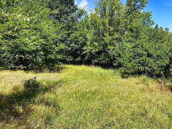 3rd image of 1065 Road