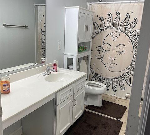 Rostroom with a bathtub and cabinets only for your use!