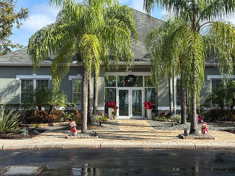 Entrance to our clubhouse and the first building you see when you enter the community! My condo is literally about 60 steps from the clubhouse!