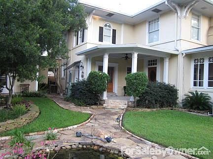 Back
						:
						New back porch with brick floor, stone walkway and pond