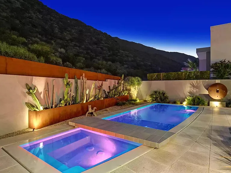 Pool and spa at night.
