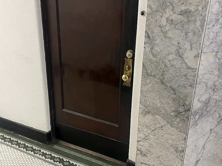 Front Door of Unit featuring Gold Hardware Front Door of Unit featuring Gold Hardware