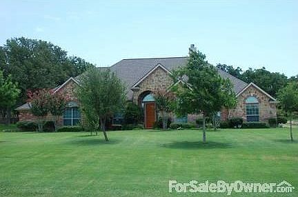 124 Rustling Elm Way : 3425 sq ft ranch with stone and brick exterior with beautiful landscape.