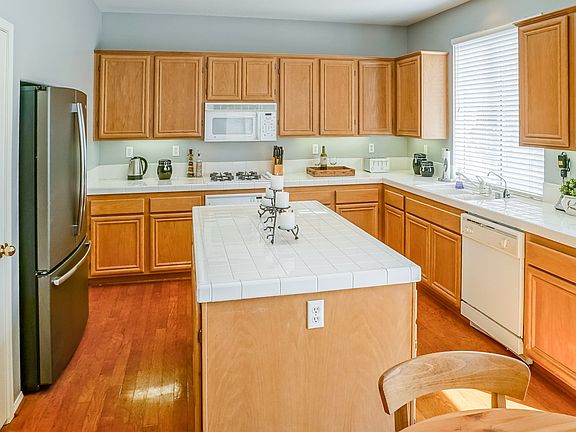 Kitchen has walk in pantry