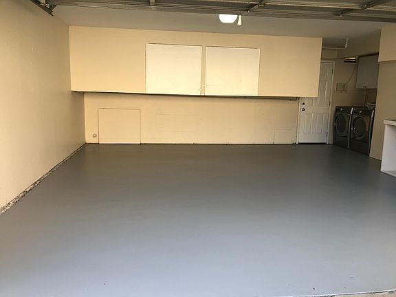 Inside garage (laundry machines are for sale)