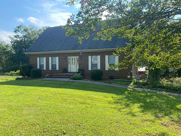 Large landscaped front yard.
