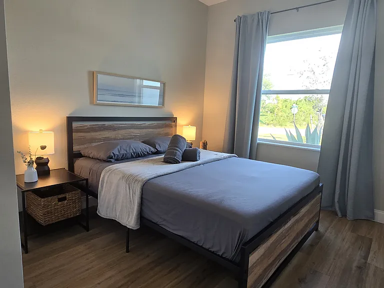 Front bedroom with queen bed. Both are currently rented. (not furnished)