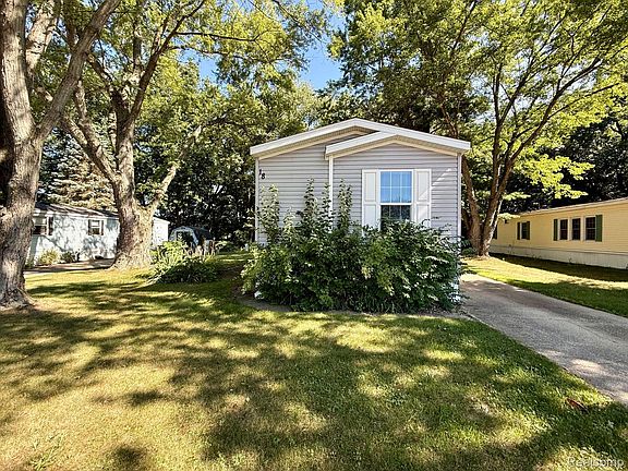 2nd image of 10450 6 Mile Rd Lot 18