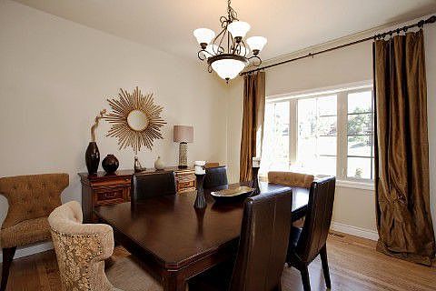 Formal dining room with gleaming hardwood floors