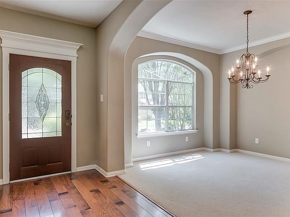 Beautiful stained front door with glass inlay