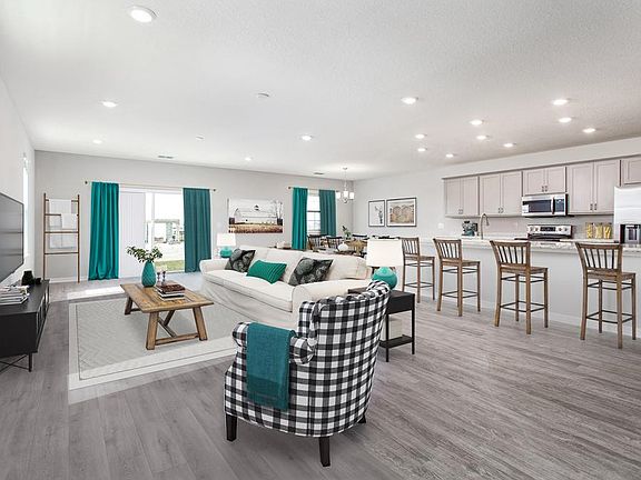 Warm and welcoming living area - Westbrooke home plan by Highland Homes