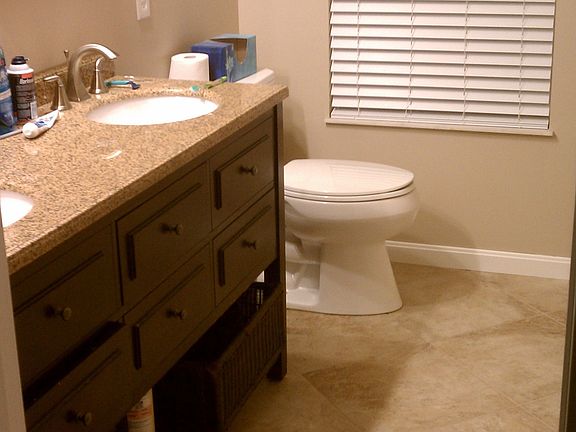 Master Bath with Double Bowl Granite Vanity and Kohler Toilet