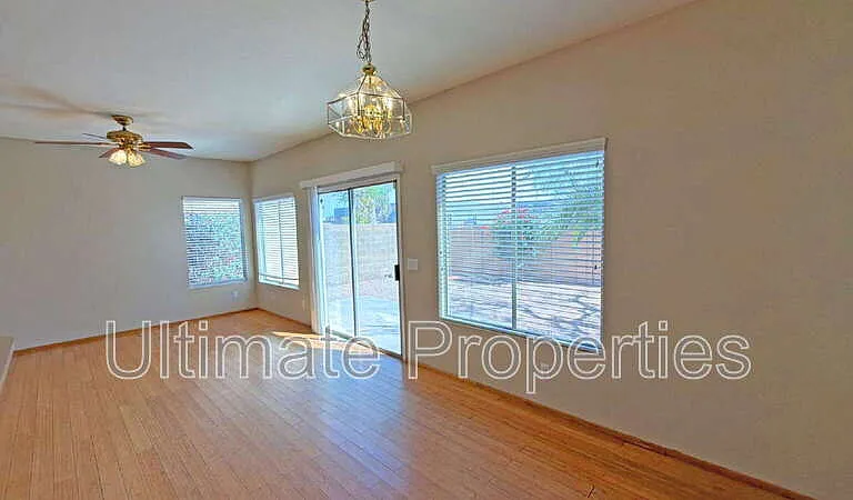 8419 W Salter Dr — Photo 3