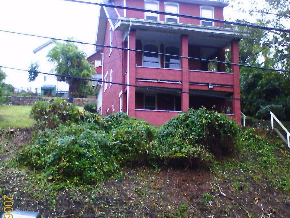 Front yard showing upper and lower porches