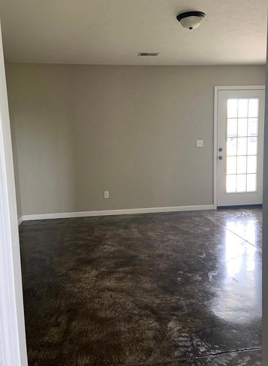Floors are stained, waxed concrete_ perfect for pets