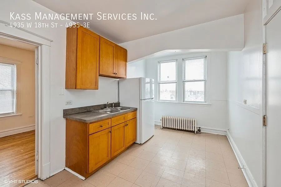 Building Photo - 4935 W 18th St #3E