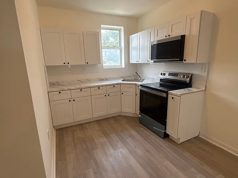 6117 Glenmore Ave — Photo 11