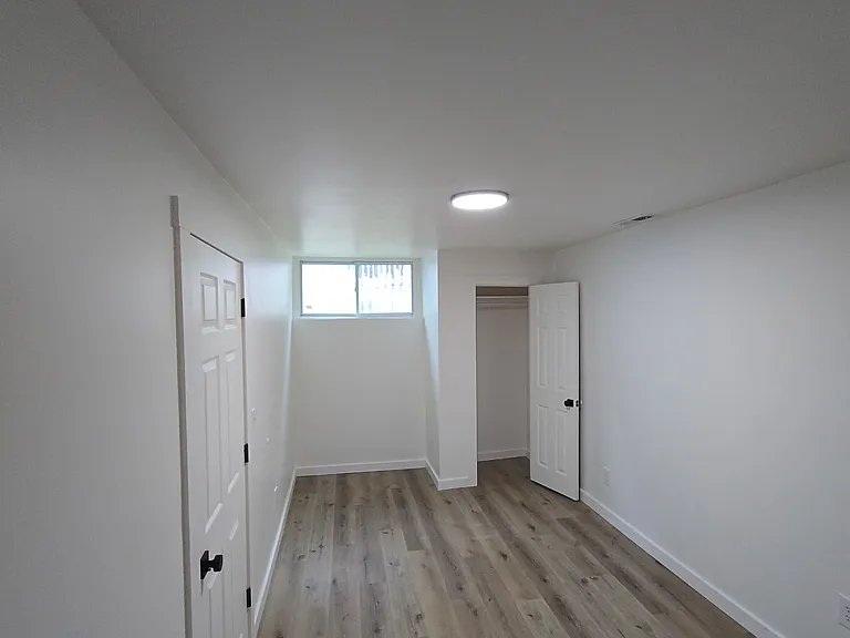 Room is wider than appears in this photo.