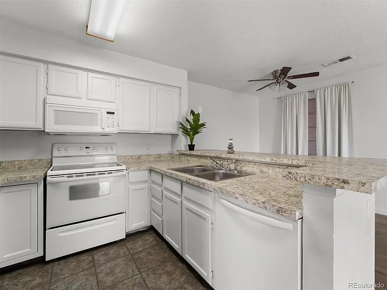 4460 S Pitkin St #120 — Photo 5