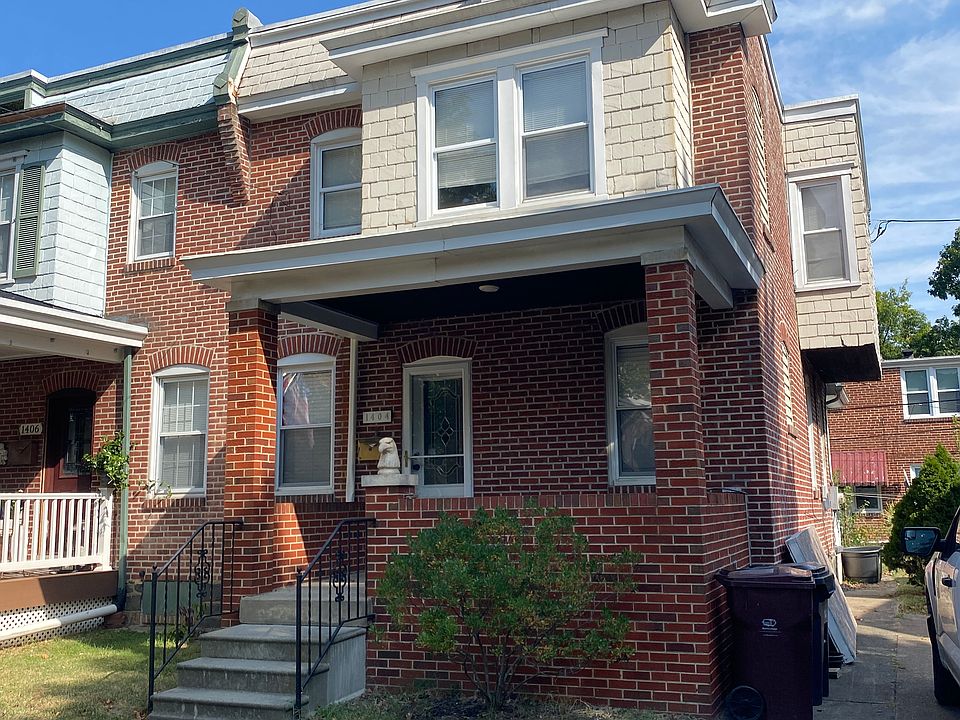Front of home with inviting covered porch perfect for enjoying the Forty Acres atmosphere