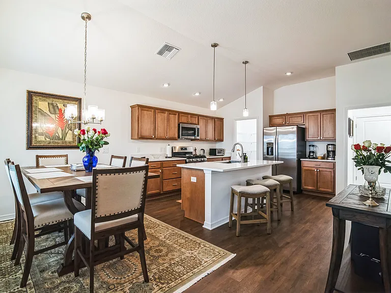 Open Area with the Dining Room and the Kitchen of the House.