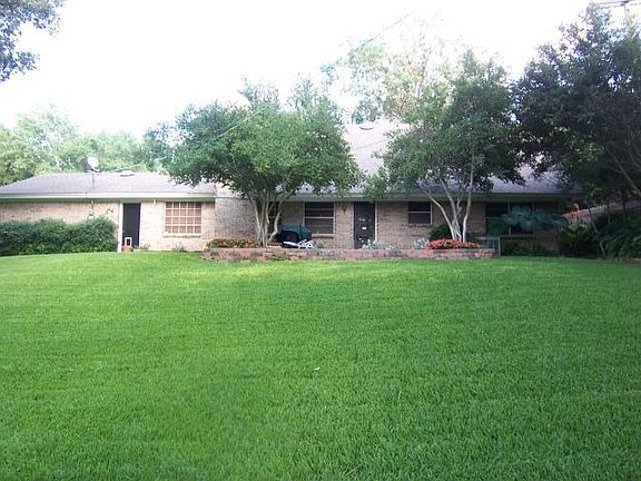 Huge back yard with trees