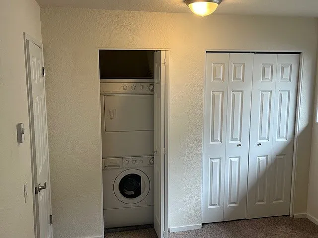 Guest bed with new Stack Washer/Dryer