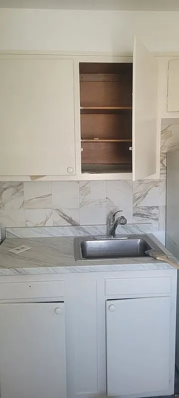 7712 Watson St — Photo 3