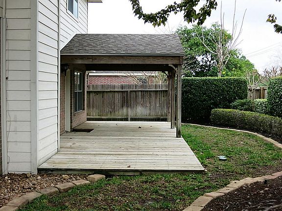 View of back yard nicely landscaped