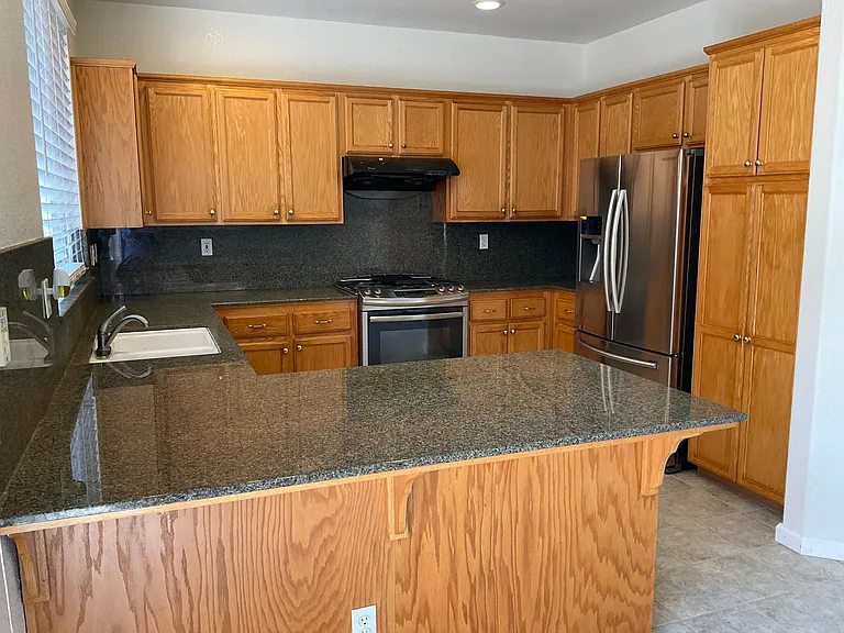 Kitchen with granite countertops