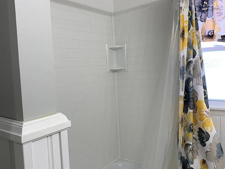 2nd floor bathroom 
tub & subway tile shower combo