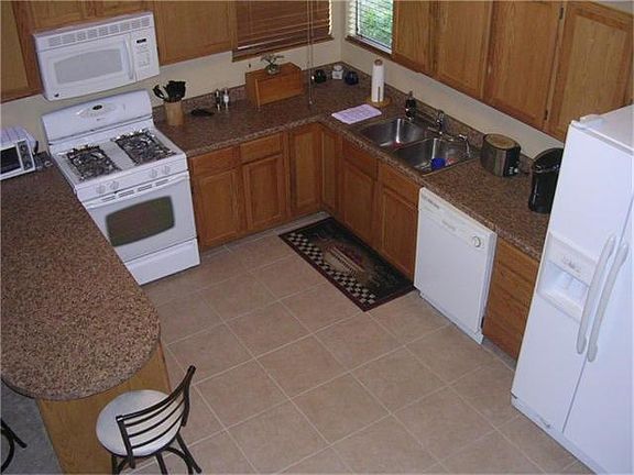 LOOKING DOWN AT KITCHEN